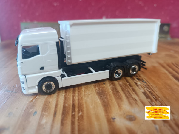 Herpa MAN TGX GX Motorwagen mit Abrollkinematik und Container weiß