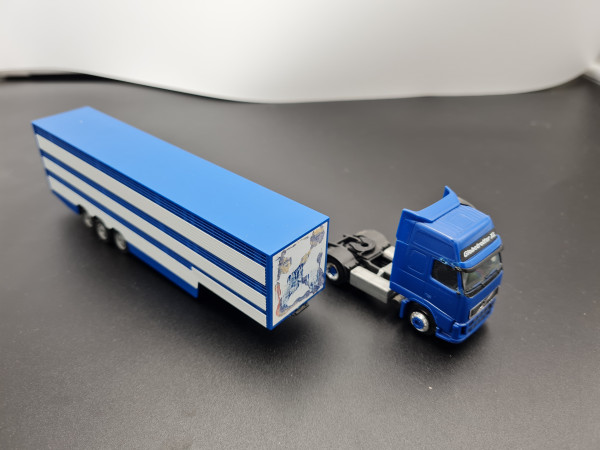 Herpa Volvo FH GL XL Tiertransportsattelzug blau weiß